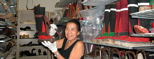 Ruth in the Museum's vault with some of "her" Tibetan  boots in 2005. Copyright ©2013 Ruth Lor Malloy