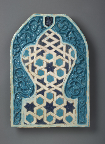 Tile Panel. Central Asia. 14th Century. Earthenware, carved & glazed. 56 X 39 cm. AKM572. Image courtesy Aga Khan Museum. 
