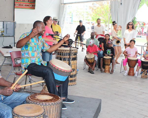 Amadou Kienou teaching West African drumming at Harbourfront Centre. Image Copyright ©2016 Ruth Lor Malloy