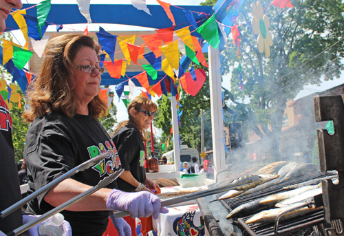 Cooking Fish at the 2013 Portugal Day Parade. Copyright ©2014 Ruth Lor Malloy